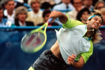 Andre Agassi playing tennis